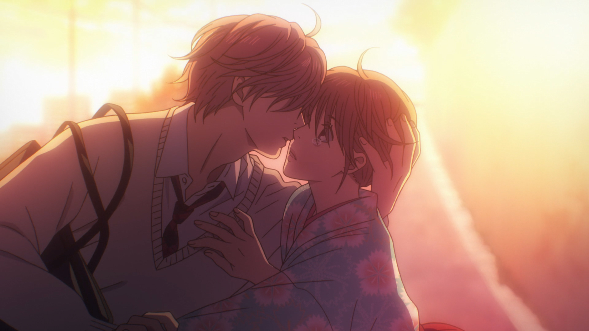 Image of a sad anime couple sharing a last kiss